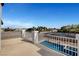 Backyard view showcasing in-ground pool and distant neighborhood views at 6315 N El Capitan Way, Las Vegas, NV 89149