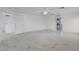 Bright living room with modern white tile floors at 6315 N El Capitan Way, Las Vegas, NV 89149