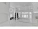 Bright interior with marble flooring, fireplace, and open floorplan with high ceilings at 6315 N El Capitan Way, Las Vegas, NV 89149
