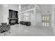 A spacious living room with a fireplace and high ceilings at 6315 N El Capitan Way, Las Vegas, NV 89149
