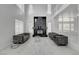 A bright living room with a fireplace and marble floors at 6315 N El Capitan Way, Las Vegas, NV 89149