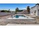 Inviting backyard pool with concrete surround and two-story home at 6315 N El Capitan Way, Las Vegas, NV 89149