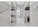 Walk-in closet with multiple rows of shelving and clothing rods at 6315 N El Capitan Way, Las Vegas, NV 89149