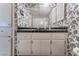 A bathroom vanity with floral wallpaper at 3125 Pinehurst Dr # A, Las Vegas, NV 89109