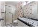 Bathroom with shower, single sink, and floral wallpaper at 3125 Pinehurst Dr # A, Las Vegas, NV 89109