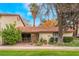 Charming single-story home featuring a tile roof, lush landscaping, and a well-maintained front yard at 3125 Pinehurst Dr # A, Las Vegas, NV 89109