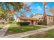 Attractive home with a well-manicured lawn, mature trees and desert landscaping at 3125 Pinehurst Dr # A, Las Vegas, NV 89109