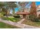 Charming home with a well-manicured lawn and mature trees providing ample shade at 3125 Pinehurst Dr # A, Las Vegas, NV 89109