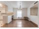 Open living and dining area with tile floors, adjacent to the kitchen at 3125 Pinehurst Dr # A, Las Vegas, NV 89109