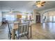 Bright dining area with tile floors and wood table at 6209 Peggotty Ave, Las Vegas, NV 89130