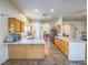 Spacious kitchen with ample cabinetry and an island at 6209 Peggotty Ave, Las Vegas, NV 89130