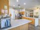 Open kitchen with a breakfast bar and views to the Gathering room at 6209 Peggotty Ave, Las Vegas, NV 89130