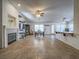 Open concept living space with tile floors and a fireplace at 6209 Peggotty Ave, Las Vegas, NV 89130