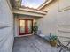 Covered patio with seating area and potted plants at 6209 Peggotty Ave, Las Vegas, NV 89130