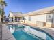 Inviting backyard oasis with a sparkling pool and spa at 6209 Peggotty Ave, Las Vegas, NV 89130