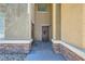 Inviting front entrance with stacked stone accents and decorative wreath at 6868 Sky Pointe Dr # 2039, Las Vegas, NV 89131