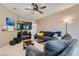 Comfortable living room with a large sofa, perfect for relaxing and entertaining at 6868 Sky Pointe Dr # 2039, Las Vegas, NV 89131