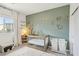 Bedroom with sage green accent wall, crib and decorative animal wall art at 10172 Magnolia Creek St, Las Vegas, NV 89141