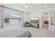 A light-filled bedroom features a plush bed and a serene, modern aesthetic at 10172 Magnolia Creek St, Las Vegas, NV 89141