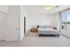 Main bedroom with large window and closet at 10172 Magnolia Creek St, Las Vegas, NV 89141