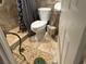 Bathroom with tile flooring, shower, and decorative turtle accents at 2813 Searles Ave, Las Vegas, NV 89101