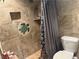 Bathroom with shower, decorative turtle accents, and tile flooring at 2813 Searles Ave, Las Vegas, NV 89101