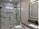 Bathroom with modern vanity, walk-in shower, and toilet at 3060 Spy Glass Ave, Pahrump, NV 89048