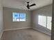 Bright bedroom with ceiling fan and window at 3060 Spy Glass Ave, Pahrump, NV 89048