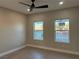 Bright bedroom with ceiling fan and two windows at 3060 Spy Glass Ave, Pahrump, NV 89048