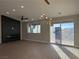 Living room featuring hardwood floors, a fireplace, and abundant natural light at 3060 Spy Glass Ave, Pahrump, NV 89048