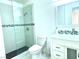 Modern bathroom with a glass shower, vanity, and toilet at 4428 W Lake Mead Blvd # 201, Las Vegas, NV 89108