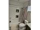 Clean bathroom with subway tile, shower/tub combo, and toilet at 7813 Blue Charm Ave, Las Vegas, NV 89149