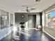 Living room with fireplace and dark hardwood floors at 11265 Newbury Hills Ave, Las Vegas, NV 89138