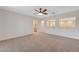 Spacious bonus room with decorative cutouts to the loft area and natural light at 7943 Sleeping Lily Dr, Las Vegas, NV 89178
