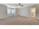Spacious bonus room with shuttered windows, ceiling fan, and entry to the bathroom at 7943 Sleeping Lily Dr, Las Vegas, NV 89178