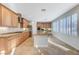 Bright kitchen features custom cabinets, stainless steel appliances, and a center island at 7943 Sleeping Lily Dr, Las Vegas, NV 89178