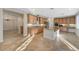 The kitchen features custom cabinets, stainless steel appliances, and a center island at 7943 Sleeping Lily Dr, Las Vegas, NV 89178