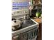 Electric stove and oven, burner needs cleaning at 4243 E Carey Ave, Las Vegas, NV 89115