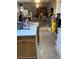 A view into a cluttered living room with furniture and various items at 4243 E Carey Ave, Las Vegas, NV 89115