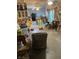 A cluttered living room with a sofa and chairs at 4243 E Carey Ave, Las Vegas, NV 89115