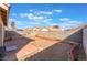Landscaped backyard with patio and block wall at 6370 Canyon Vista Ct, Las Vegas, NV 89156
