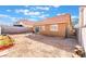 Landscaped backyard with patio and block wall at 6370 Canyon Vista Ct, Las Vegas, NV 89156