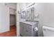 Bathroom features vanity with granite countertop and large mirror at 6370 Canyon Vista Ct, Las Vegas, NV 89156