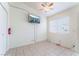 Bright and airy common area with tile flooring and a large TV at 6370 Canyon Vista Ct, Las Vegas, NV 89156