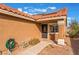 Front entrance with a security door and landscaping at 6370 Canyon Vista Ct, Las Vegas, NV 89156