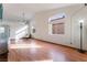 Sunlit living room showcasing hardwood floors and a comfortable seating area at 6370 Canyon Vista Ct, Las Vegas, NV 89156