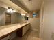 Bathroom with double vanity and large mirror at 1333 Del Mar St # 202, Las Vegas, NV 89119