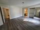 Large bedroom with mirrored closet doors and laminate flooring at 1333 Del Mar St # 202, Las Vegas, NV 89119