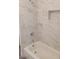 Updated bathroom with marble-look shower and tub at 417 Antelope Way, Las Vegas, NV 89145