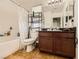 This bathroom features a shower-tub combination, single vanity, and tiled floors at 1065 Admiral Emblem St, Henderson, NV 89015